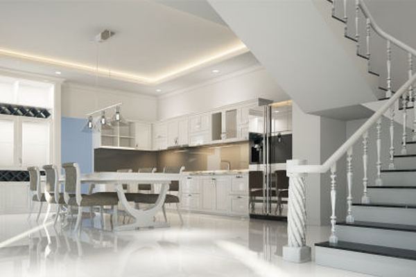 Interior architectural render — open plan kitchen and dining with staircase