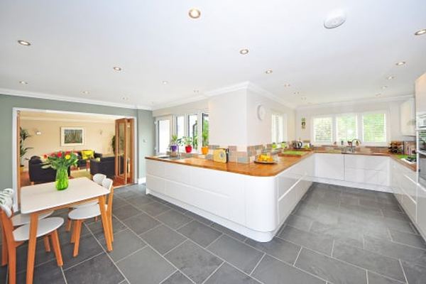 Kitchen interior architectural render — open plan layout with island and living area